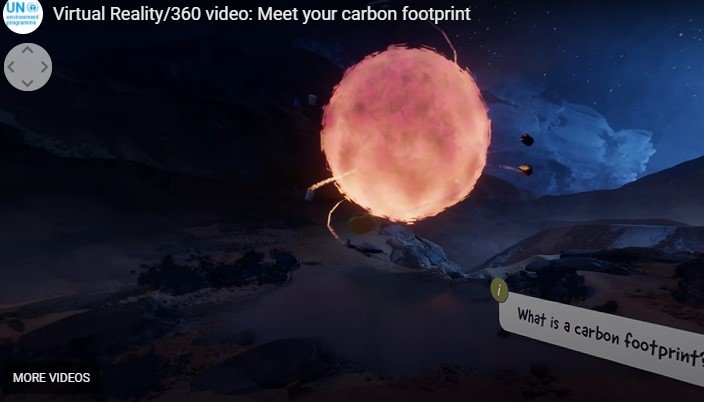 Screenshot of a VR experience displaying a glowing red sphere over an alien landscape with the question "What is a carbon footprint?".