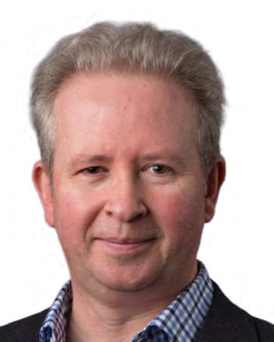 Headshot of a man with light hair wearing a blue checkered shirt.