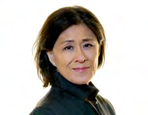 Headshot of an Asian woman with dark hair, wearing a dark top.