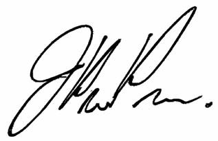 A black handwritten signature.