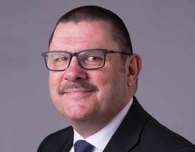 Headshot of Sir Jonathan Thompson