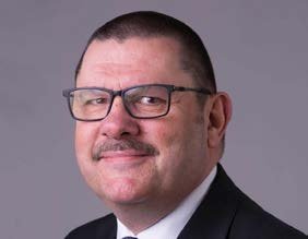 Headshot of Sir Jonathan Thompson